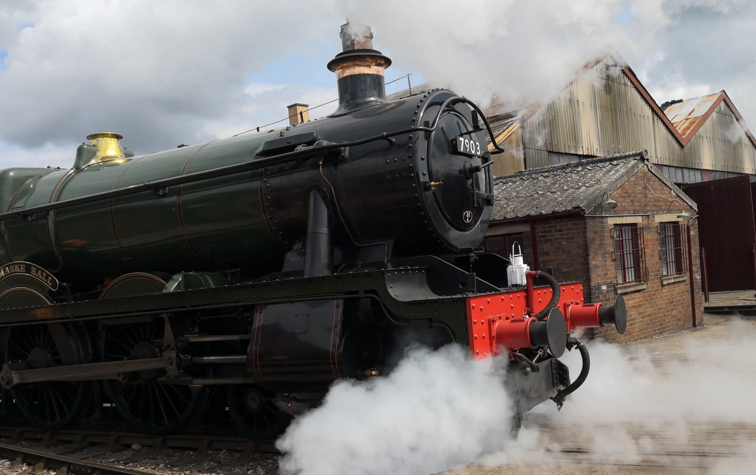 Steam train at Didcot Railway Centre with steam coming from front