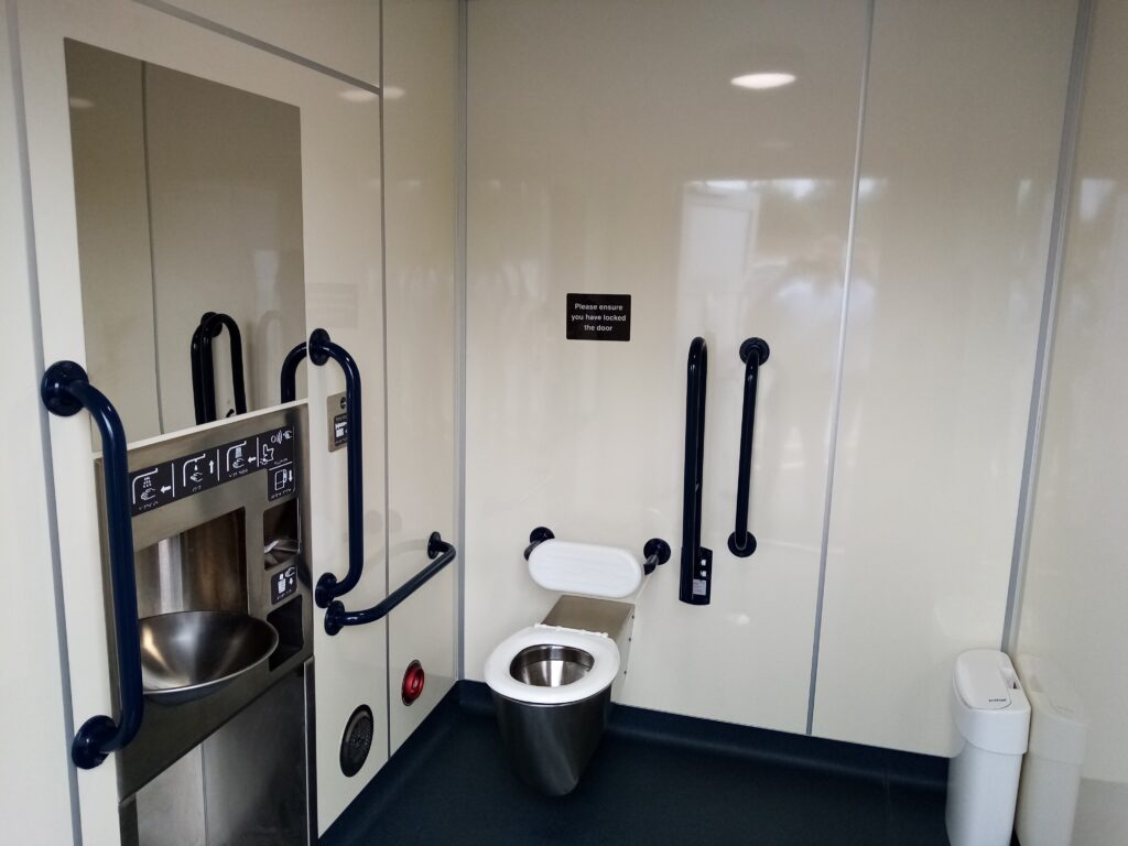 Interior shot of changing places toilet with hoist and rails