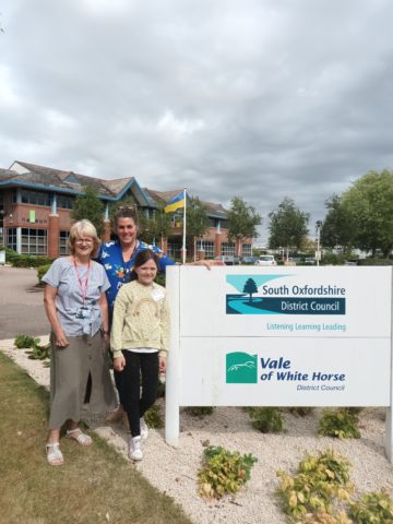 Lizzie Pugh outside Vale of White Horse District Council offices with Cllrs Bethia Thomas and Helen Pighills