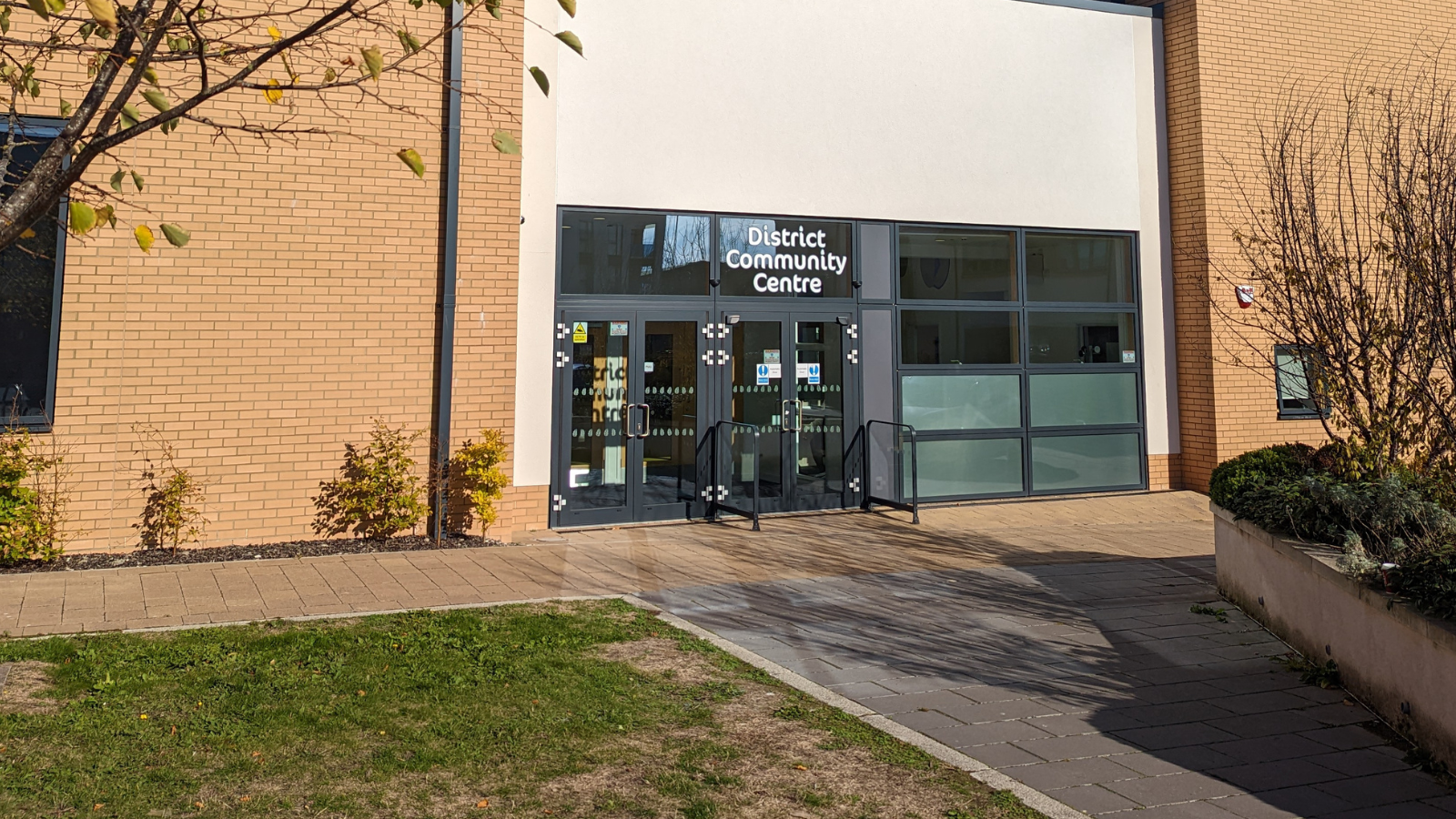 Main entrance to the District Community Centre on a sunny day