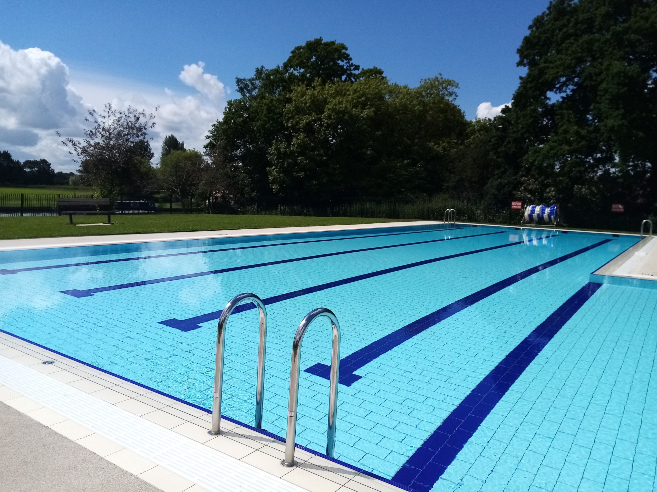 Abbey Meadow outdoor pool on a sunny day